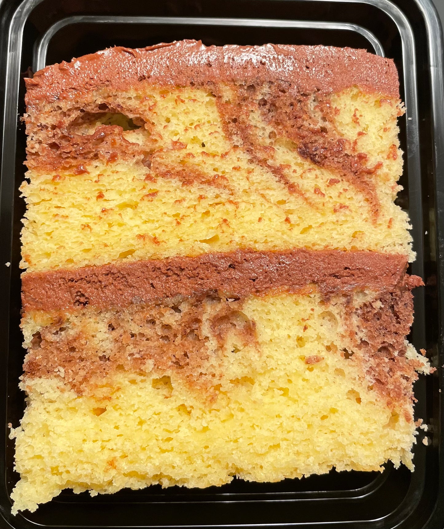 Can't decide on yellow butter cake or chocolate?  Have a slice of marble cake for the best of both worlds! Topped with our creamy chocolate buttercream.